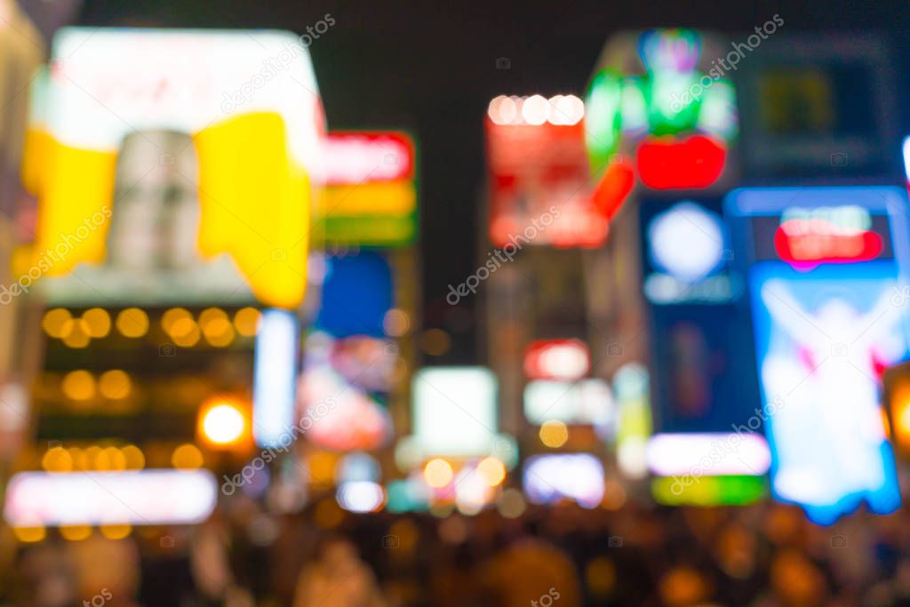 abstract blur crowd people at Osaka street market 