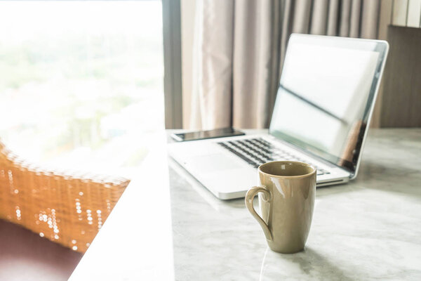 coffee cup with laptop and beautiful luxury table decoration in 