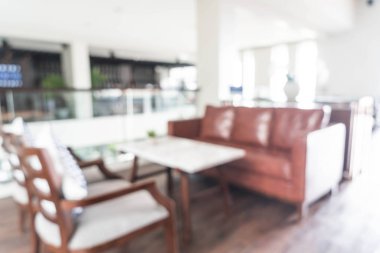 Otel lobisinde bulanık arka plan sandalye