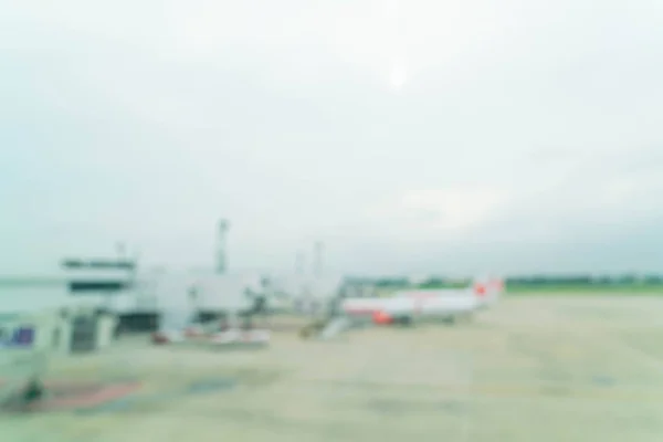Unschärfe des Flugzeugs am Flughafen-Gate — Stockfoto