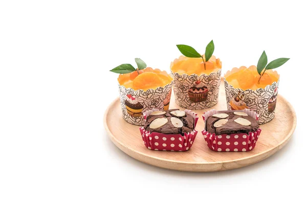 Brownies en oranje cup cake — Stockfoto