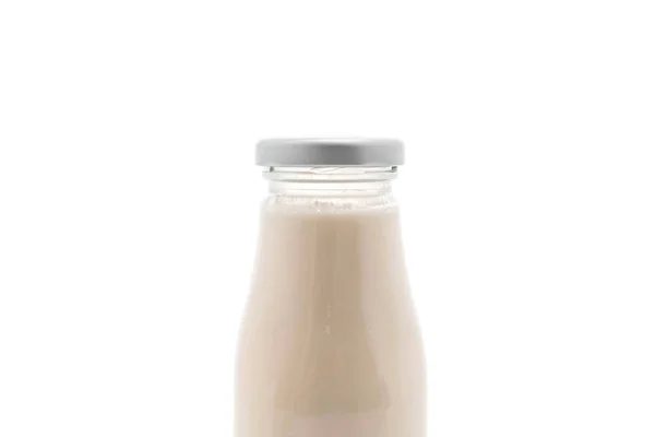 Mjölk i flaska på vit — Stockfoto
