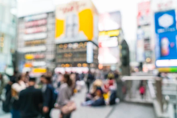 abstract blur crowd people at Osaka street market