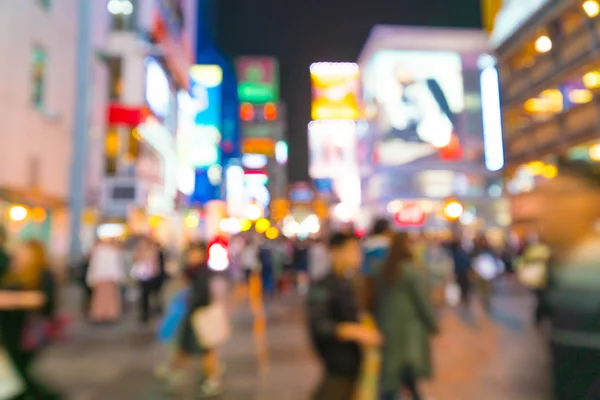 abstract blur crowd people at Osaka street market