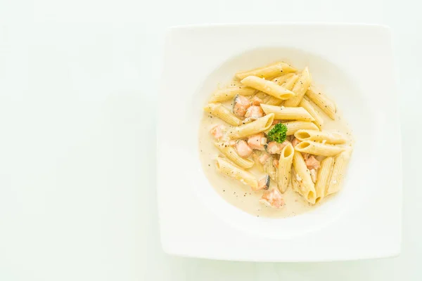 Penne carbonara pasta with salmon — Stock Photo, Image