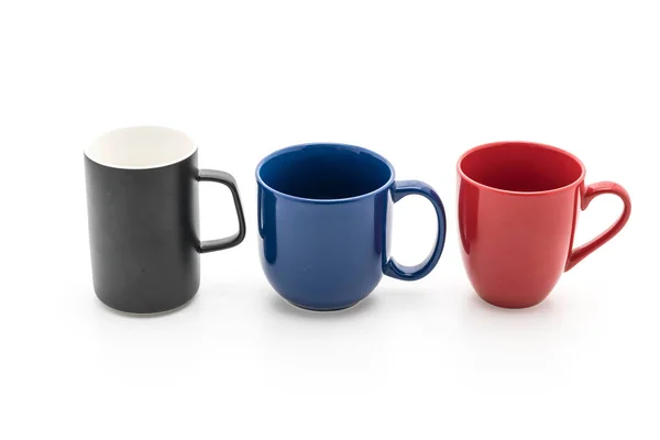 Set de tazas negras, rojas y azules sobre blanco — Foto de Stock