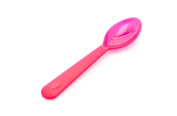 Red plastic spoon — Stock Photo, Image