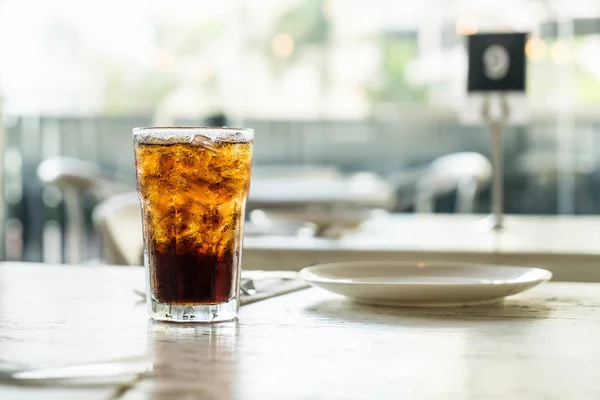 Iced cola on the table — Stock Photo, Image