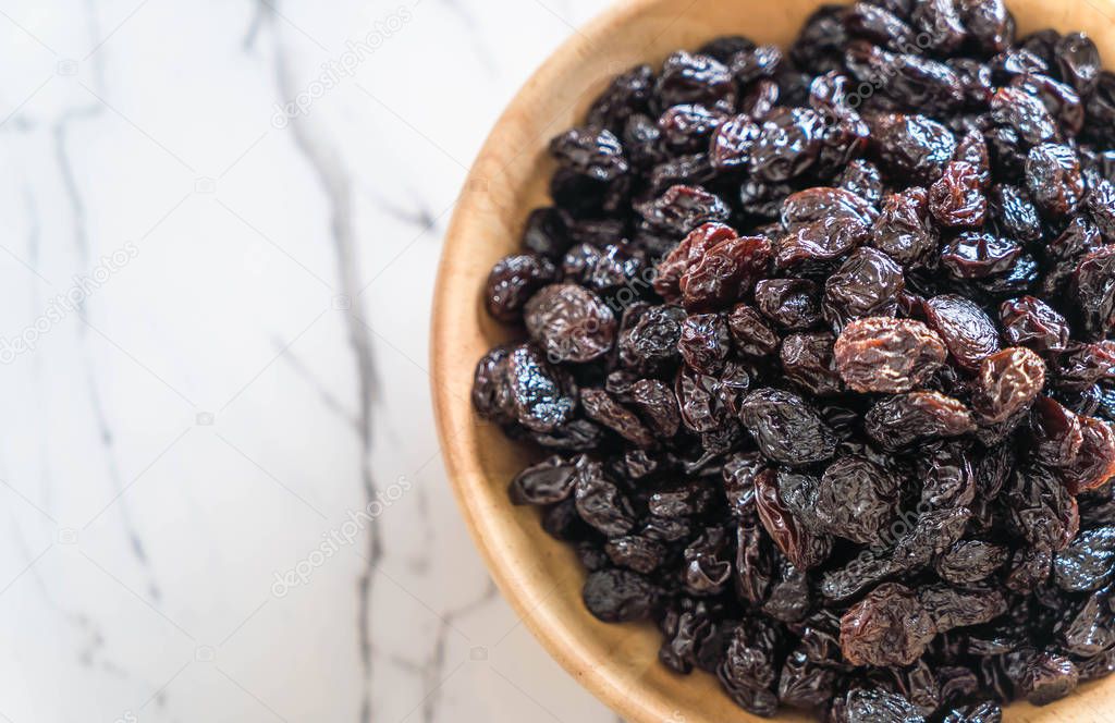 black raisins in bowl