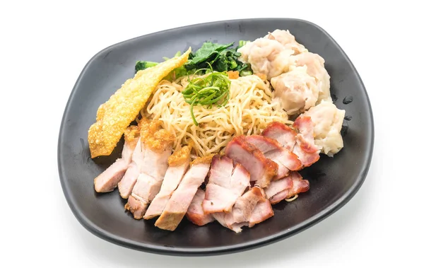 Egg noodle with red roast pork, crispy pork and dumplings — Stock Photo, Image