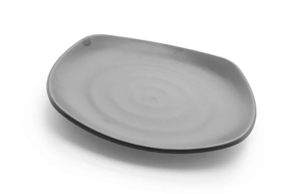Black plate on white — Stock Photo, Image