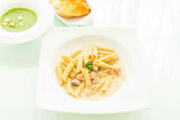 Penne carbonara pasta with salmon — Stock Photo, Image