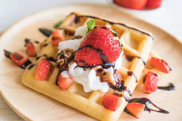 Waffle with strawberry on wood — Stock Photo, Image