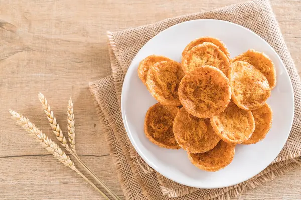 kurutulmuş rendelenmiş domuz etinin pirinç kraker