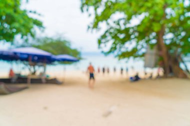 güzel hurma şemsiye ve deniz sandalyeye ile bulanıklık ve 