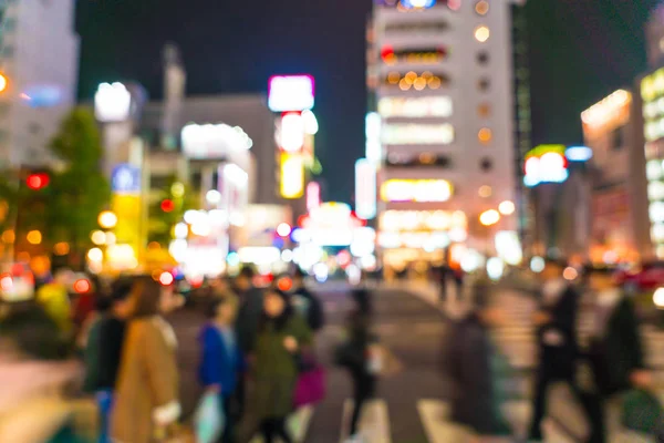 Abstrakte Unschärfe verwirrt die Menschen auf dem Osaka-Straßenmarkt — Stockfoto