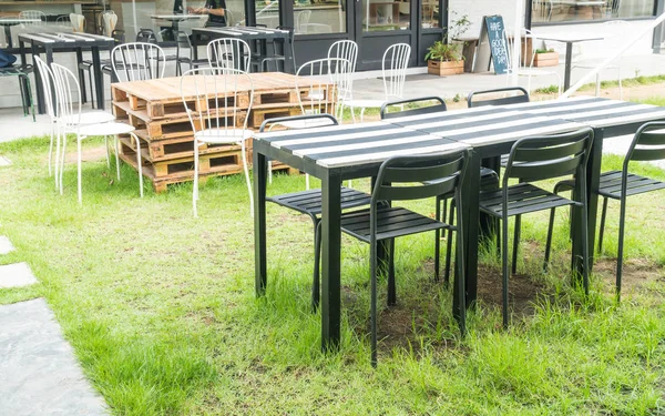 Empty outdoor patio chair — Stock Photo, Image