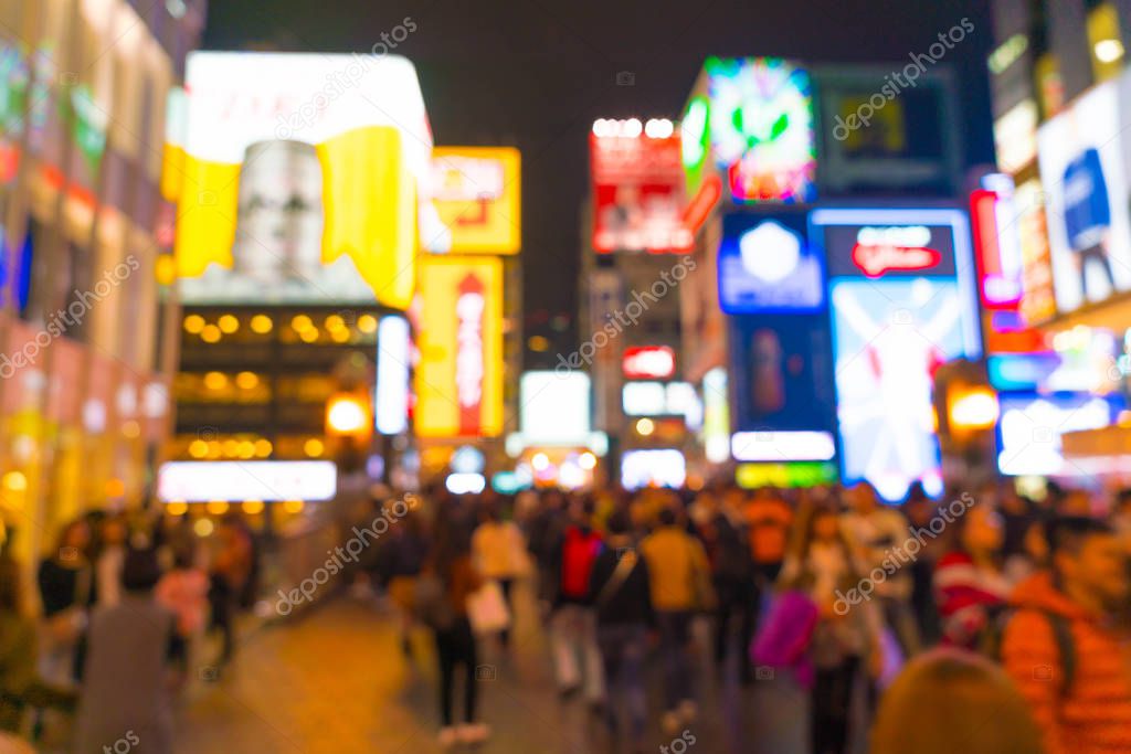 abstract blur crowd people at Osaka street market 