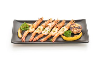 Sarımsaklı ve limonlu kızarmış karides.