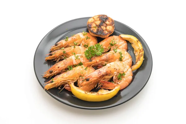 Sarımsaklı ve limonlu kızarmış karides.