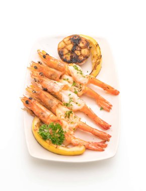 Sarımsaklı ve limonlu kızarmış karides.