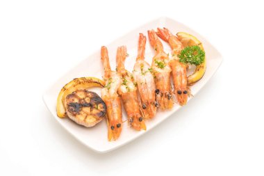 Sarımsaklı ve limonlu kızarmış karides.