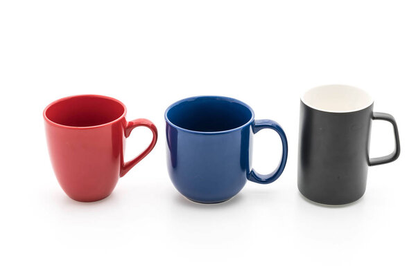 Set of black, red and blue cups on white 