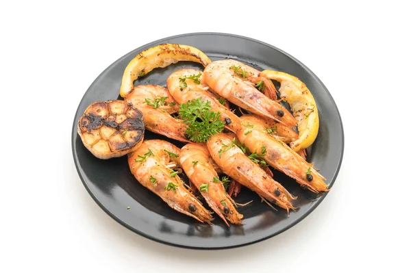 Sarımsaklı ve limonlu kızarmış karides.