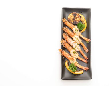 Sarımsaklı ve limonlu kızarmış karides.