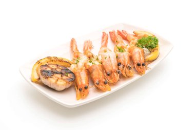 Sarımsaklı ve limonlu kızarmış karides.