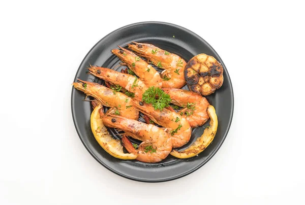 Sarımsaklı ve limonlu kızarmış karides.