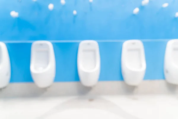 Abstract blur in men toilet — Stock Photo, Image