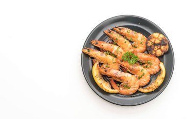 Sarımsaklı ve limonlu kızarmış karides.