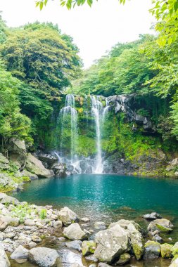 cheonjeyeon waterfalls in Jeju Isaland clipart