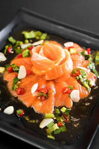 Fresh salmon raw spicy salad — Stock Photo, Image