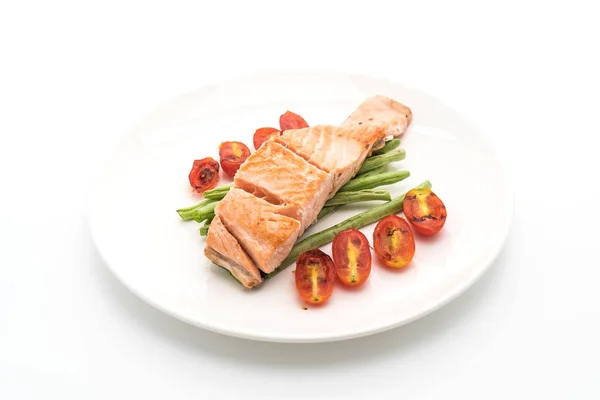 Grilled salmon steak on white — Stock Photo, Image