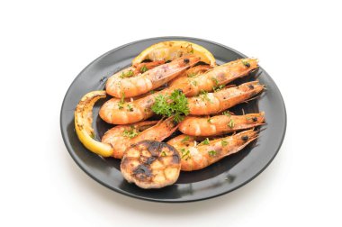 Sarımsaklı ve limonlu kızarmış karides.