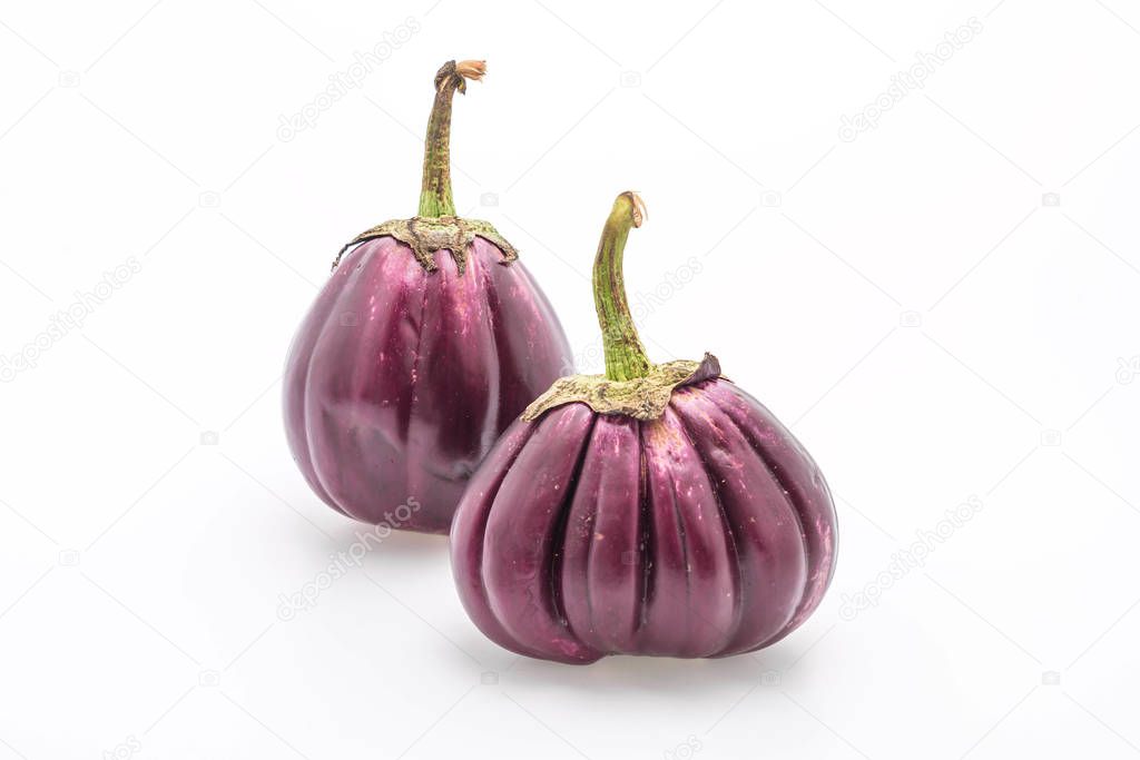 fresh eggplant on white