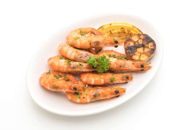 Sarımsaklı ve limonlu kızarmış karides.