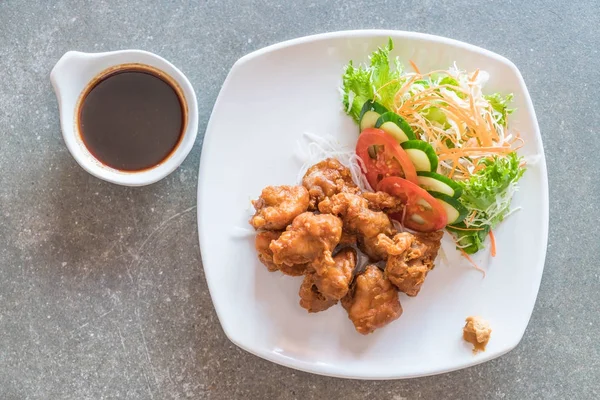 Fried chicken with tonkatsu sauce — Stock Photo, Image