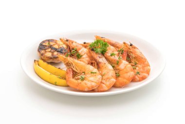 Sarımsaklı ve limonlu kızarmış karides.