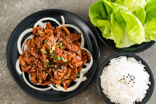 Fried pork with spicy korean sauce (bulgogi) — Stock Photo, Image