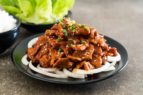 Fried pork with spicy korean sauce (bulgogi) — Stock Photo, Image