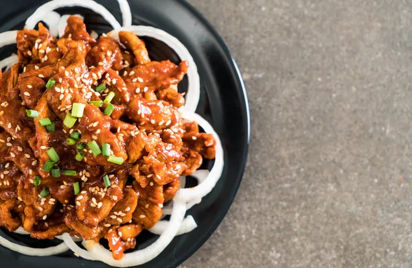 Fried pork with spicy korean sauce (bulgogi) — Stock Photo, Image