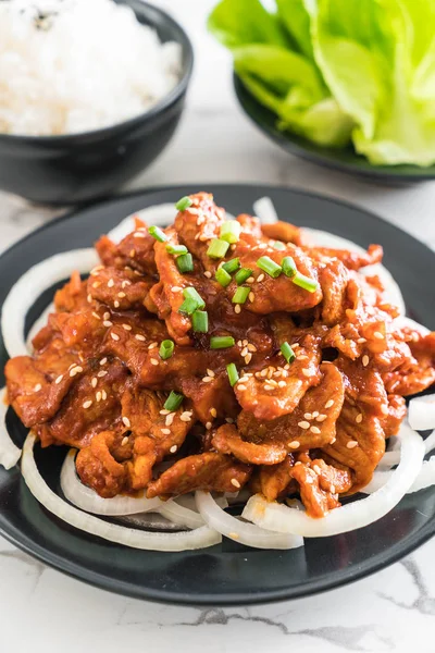 Fried pork with spicy korean sauce (bulgogi) — Stock Photo, Image