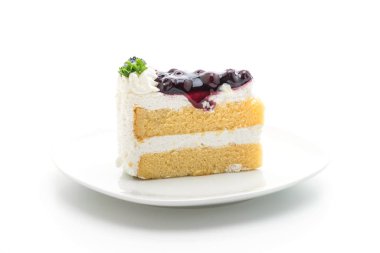 beyaz zemin üzerine üzümlü kek