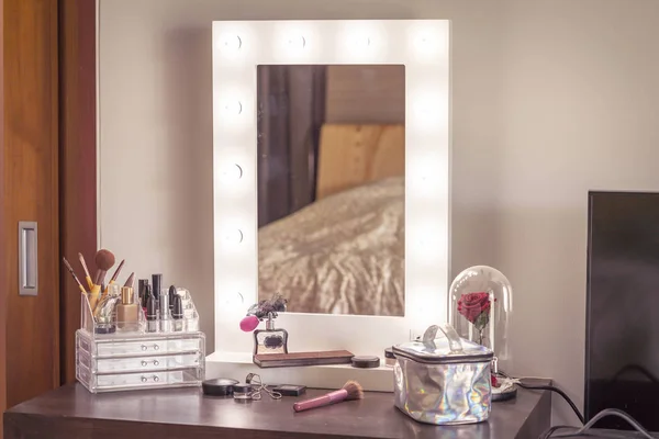 Cosmetics on table in room