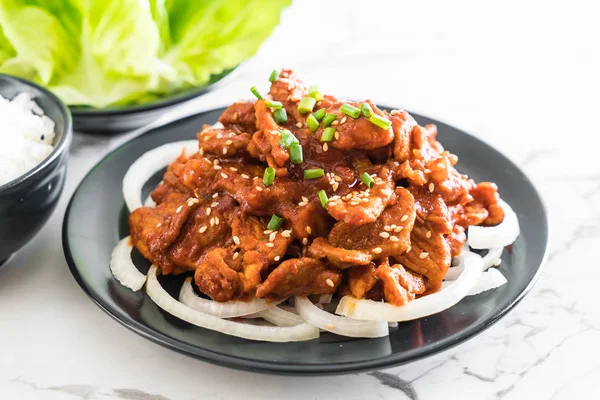 Fried pork with spicy korean sauce (bulgogi) — Stock Photo, Image