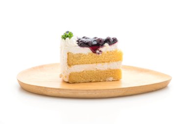 beyaz zemin üzerine üzümlü kek