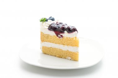 beyaz zemin üzerine üzümlü kek